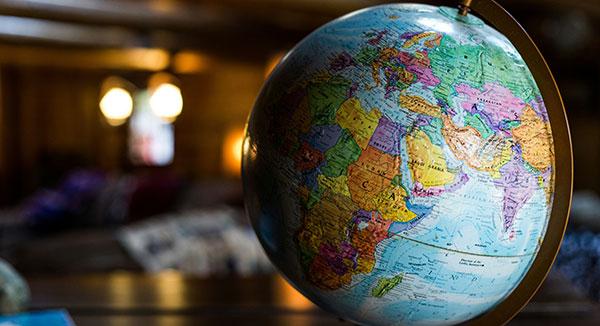 Globe on a desk focused on Middle East, North Africa, and Asia