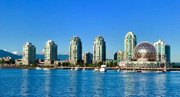 Tall buildings and a dome along the waterfront in Canada 