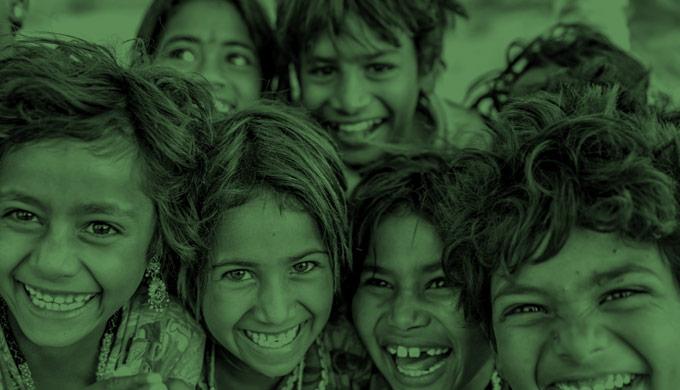 Gift Administration Indian children smiling