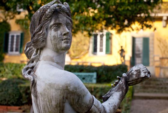 A statue in the gardens outside of Villa i Tatti near Florence, Italy