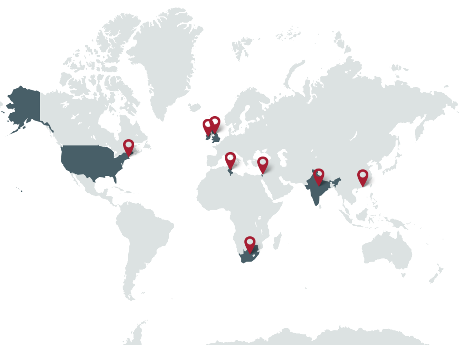 map of the world with crimson pins indicating where Harvard Global has entities