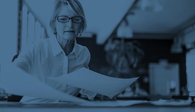 Office Administration A woman works in an office
